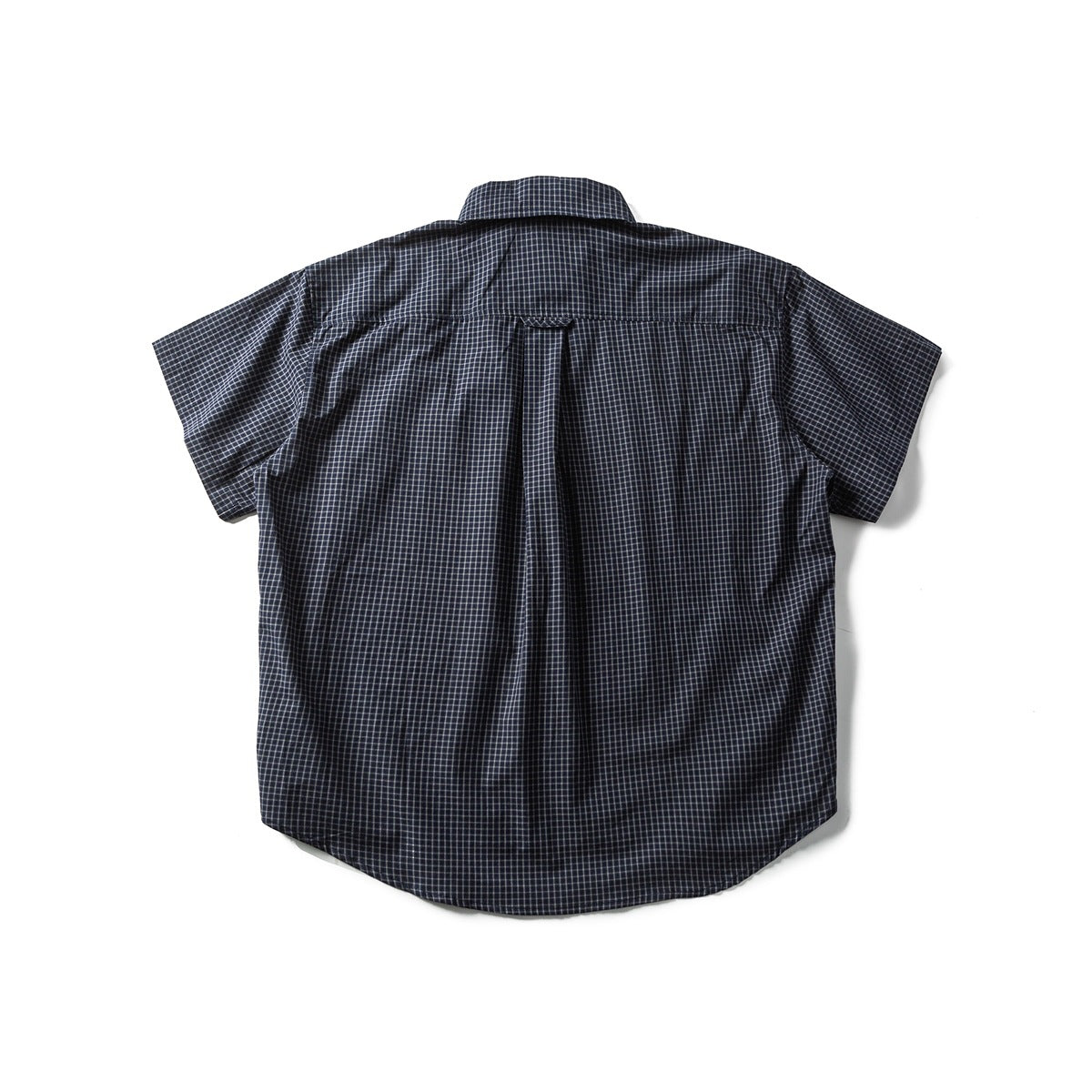 Back view of a navy plaid short-sleeve button-up shirt with a center back pleat.