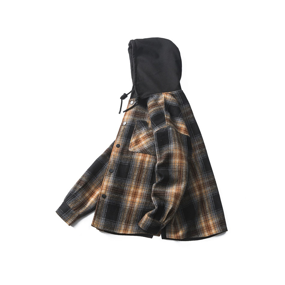 Angled side view of the plaid hooded shirt jacket, showing its black hood, front buttons, chest pocket, and sleeve.