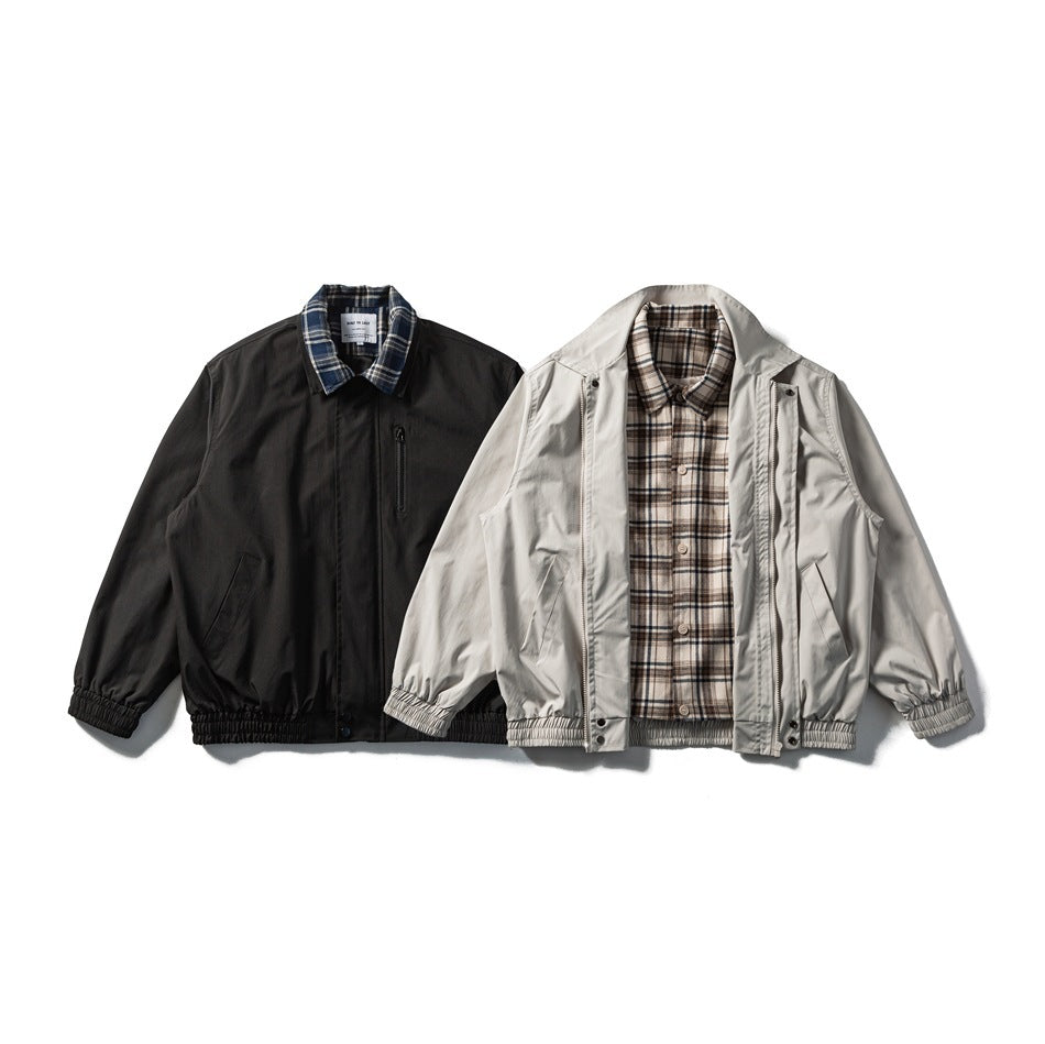 Black and light gray jackets shown from the front; the gray jacket is open to reveal plaid lining.