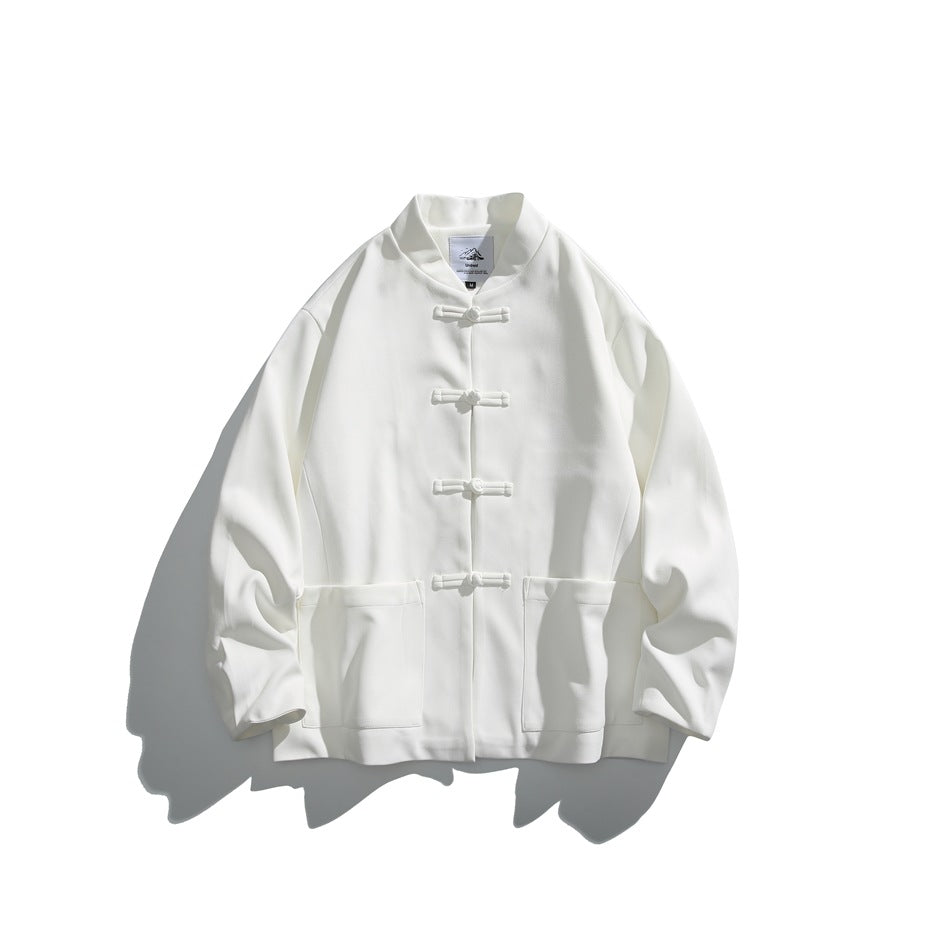 White stand-collar jacket flat lay with four knotted frog buttons and two front patch pockets