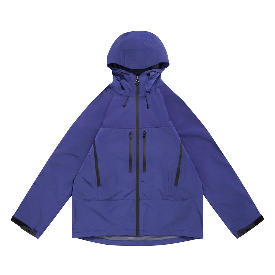 Purple hooded zip-front jacket flat lay with chest zip pockets and curved hem