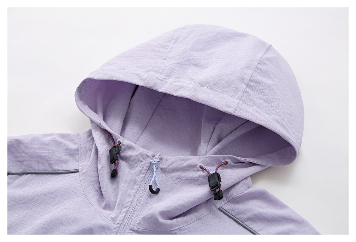 Close-up of a pale lavender jacket hood with adjustable drawcords, toggles and a front zipper.