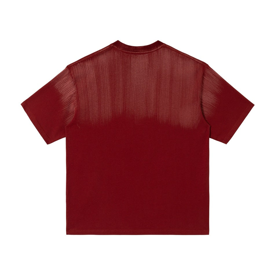 Back view of red short-sleeve crew-neck T-shirt with brushed streak gradient across the upper back and sleeves, flat lay