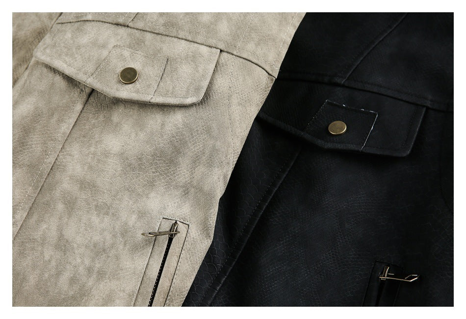 Close-up of taupe and black jacket fronts showing snap-button chest pockets and vertical zip pockets.