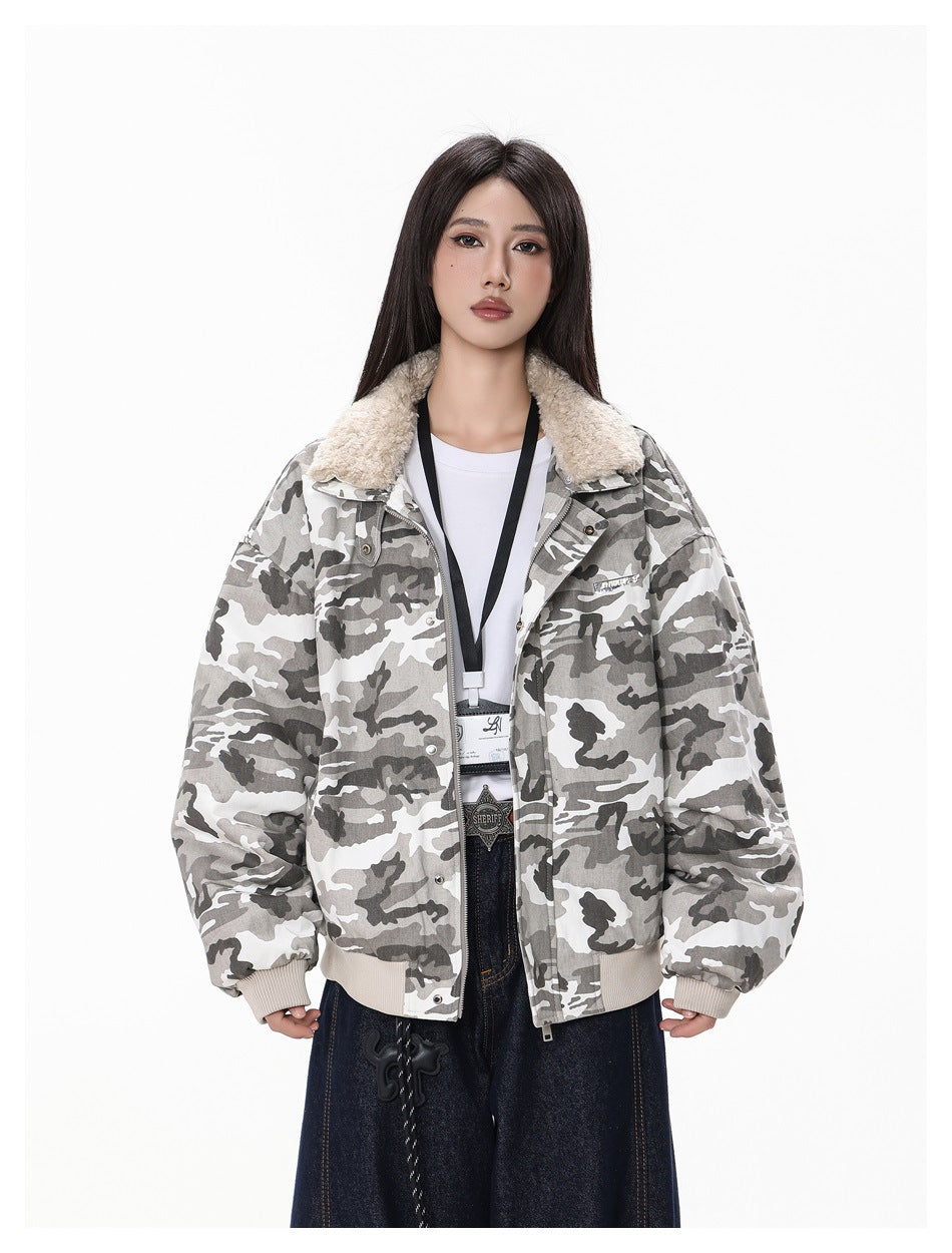 Front view of a model wearing an open gray-and-white camouflage jacket with a cream fleece collar and ribbed cuffs and hem.