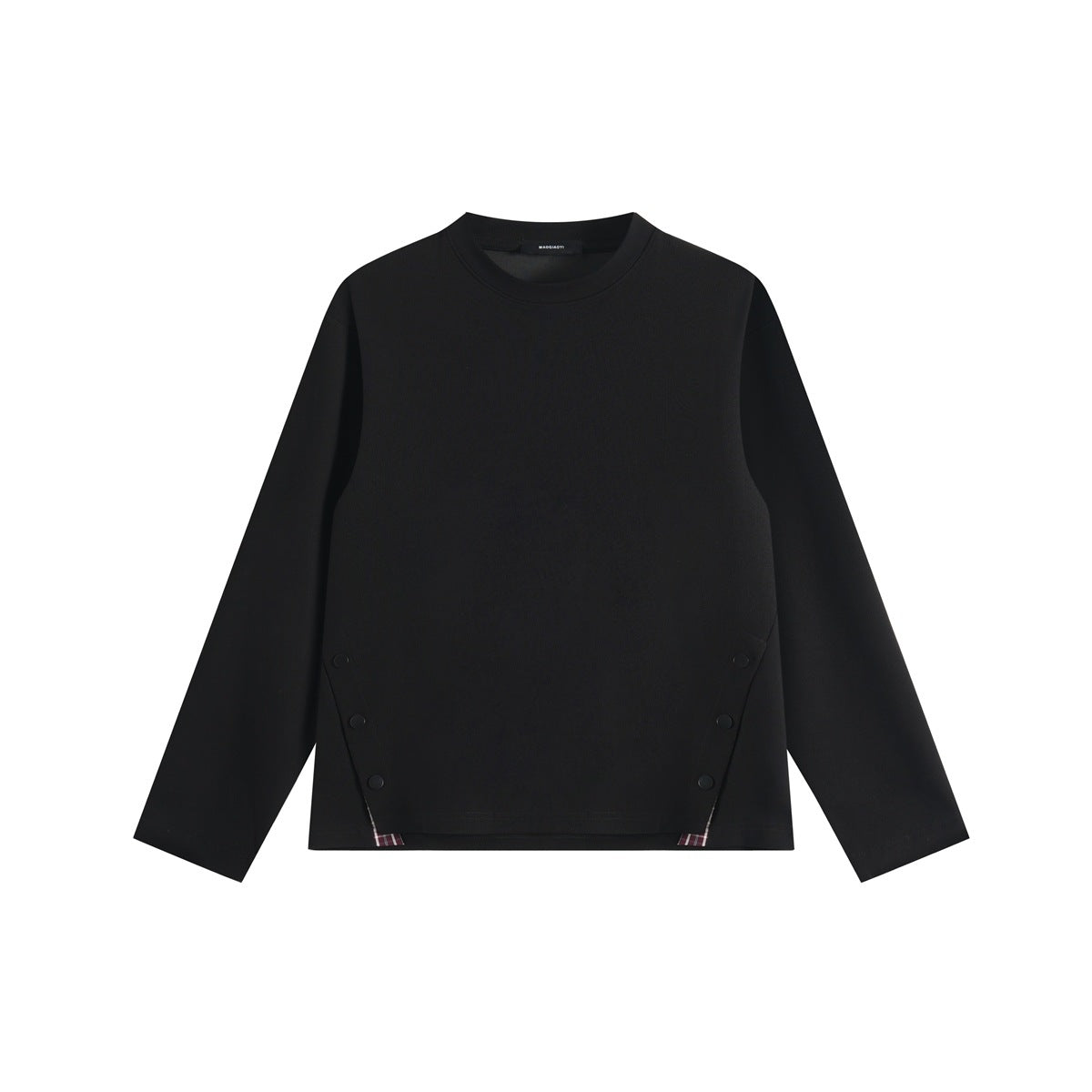 Black long-sleeve crew-neck top, flat front view, with snap buttons at both sides and plaid trim at the hem corners