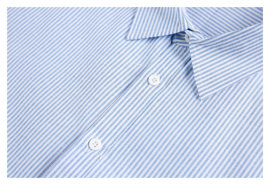 Close-up of a blue-and-white striped shirt front with collar, placket, and white buttons.