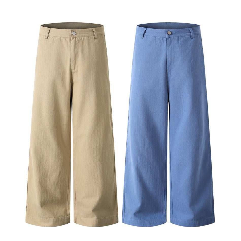 Khaki and blue wide-leg trousers side by side, front view