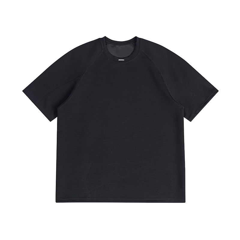 Black short-sleeve crew neck T-shirt with raglan sleeves and a small metal tag at the neckline, flat front view