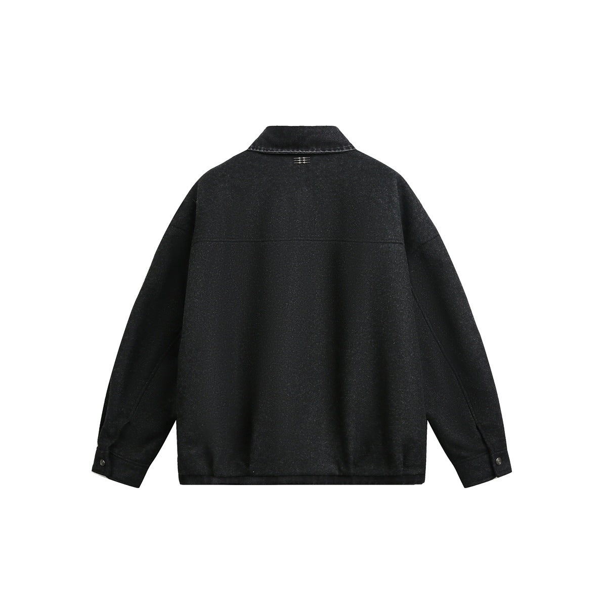Back view of a black jacket with a pointed collar and small stitched detail at the upper back.