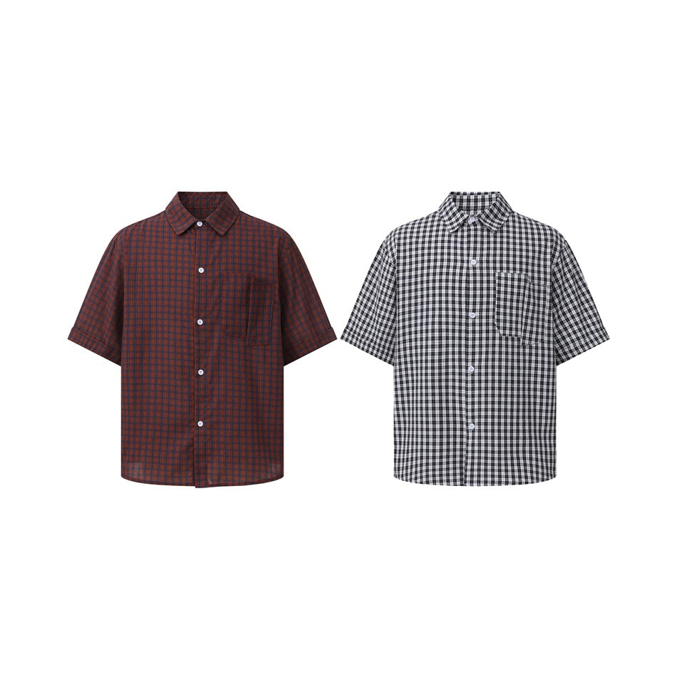 Two short-sleeve button-up shirts shown side by side: rust-red and dark check, and black-and-white check.