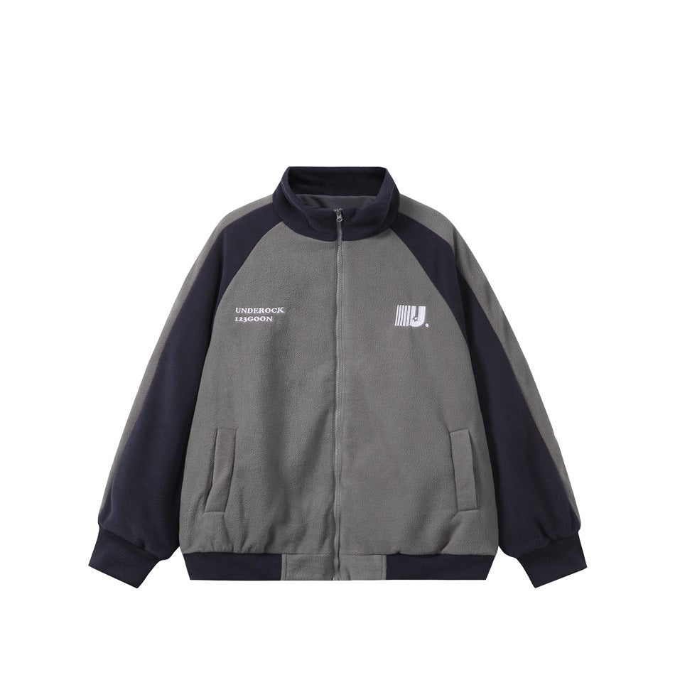 Gray zip-up fleece-texture jacket with navy raglan sleeves, stand collar, front pockets and embroidered chest logo