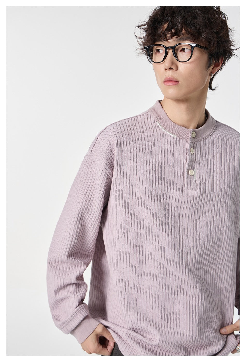 Close-up of the dusty lilac ribbed top, showing its stand collar and three-button placket.