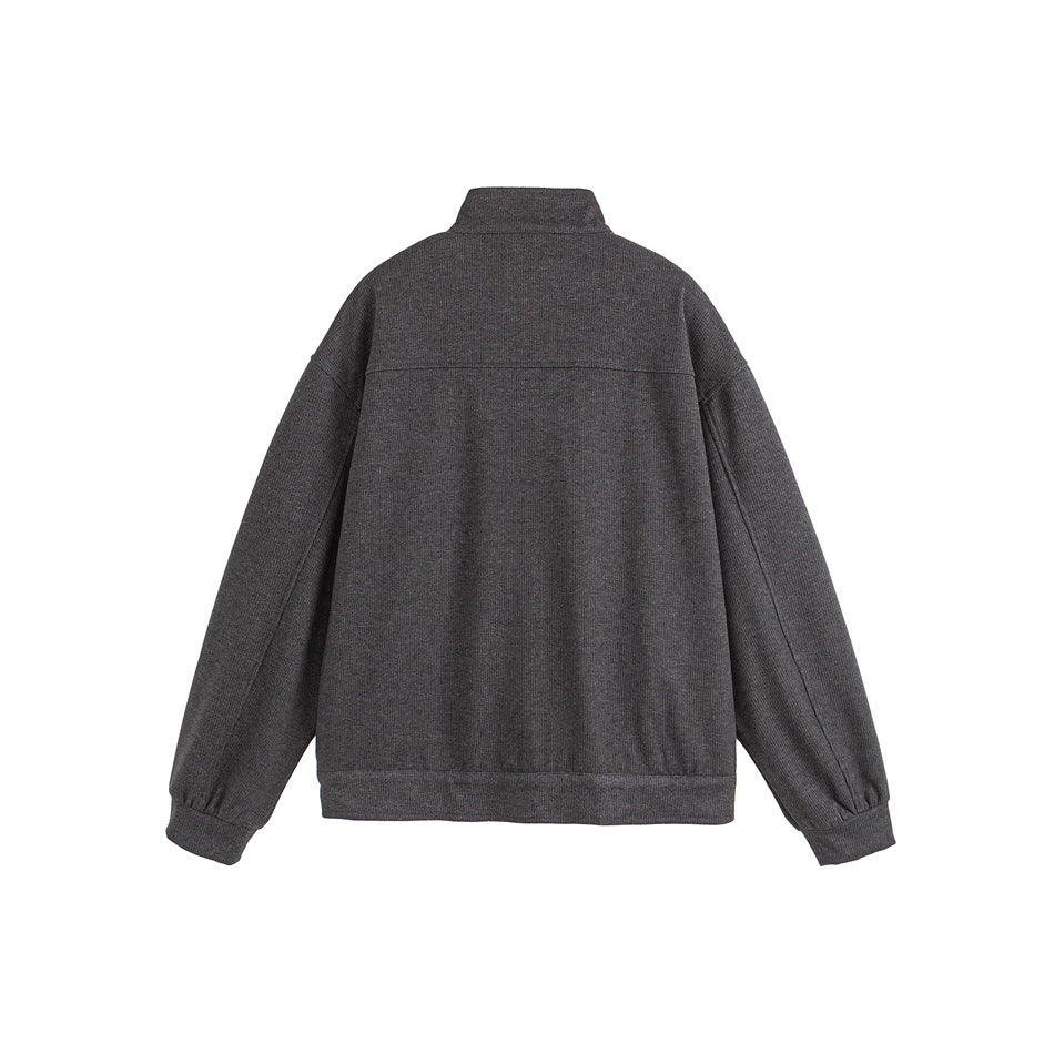 Back view of a charcoal gray long-sleeve zip jacket with a stand collar, ribbed cuffs, and hem.