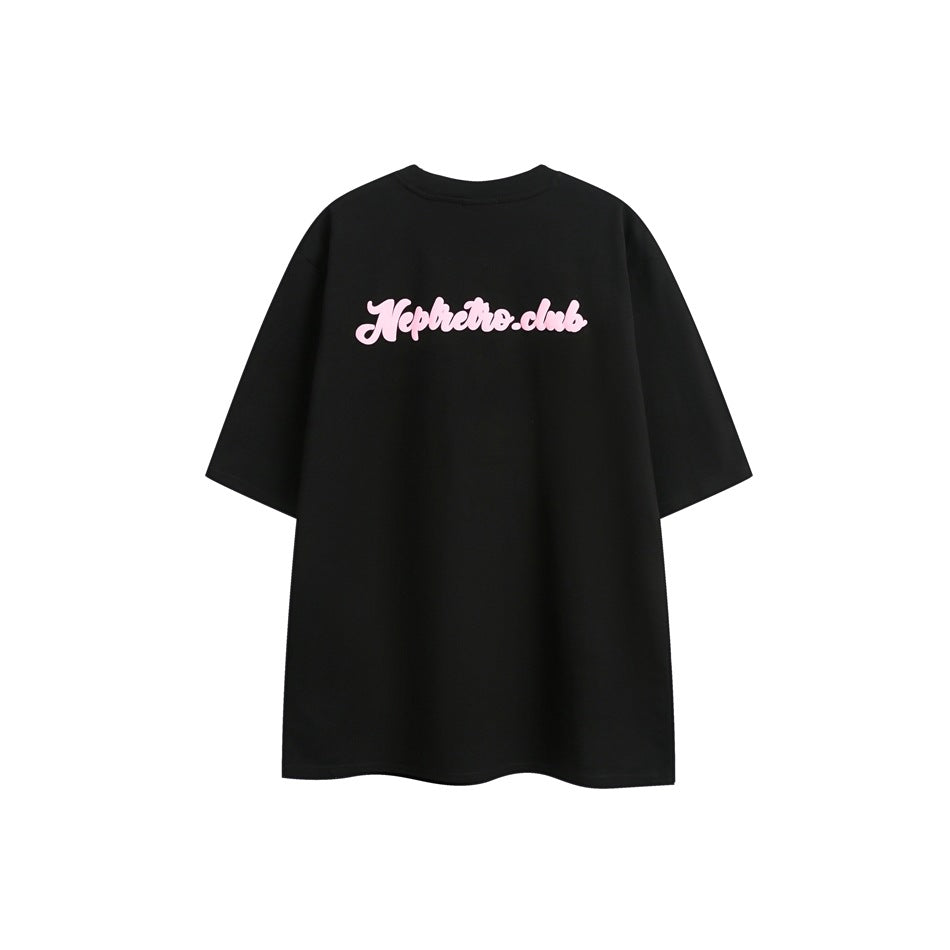 Back view of a black short-sleeve T-shirt with a small pink script graphic across the upper back.
