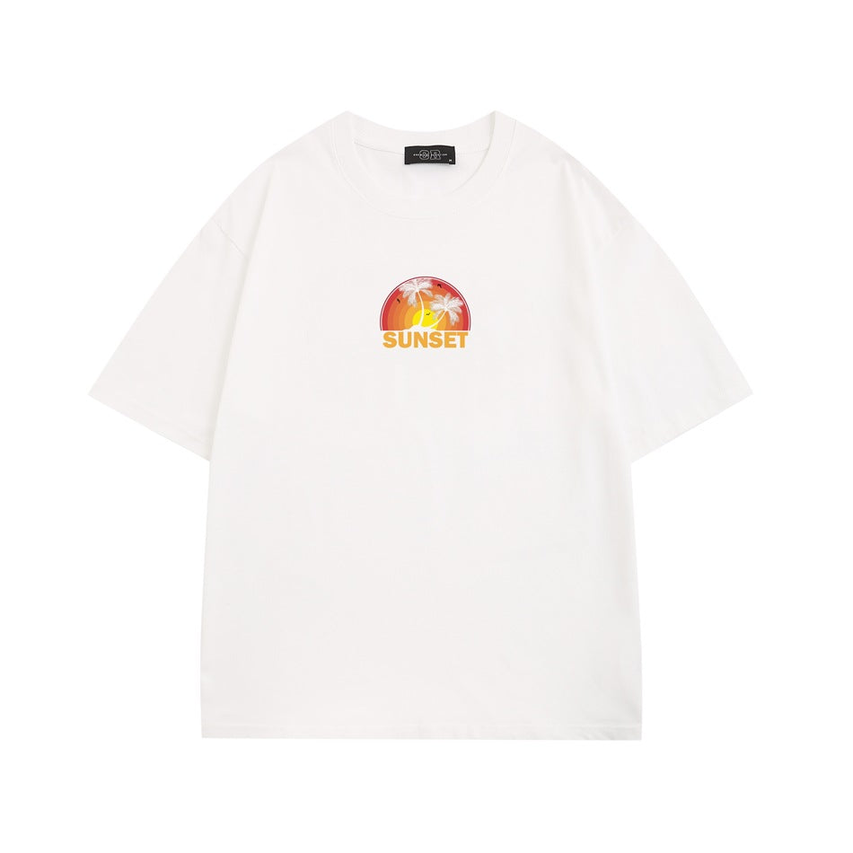 White short-sleeve crew-neck T-shirt with a small orange sunset and palm tree graphic reading “SUNSET.”