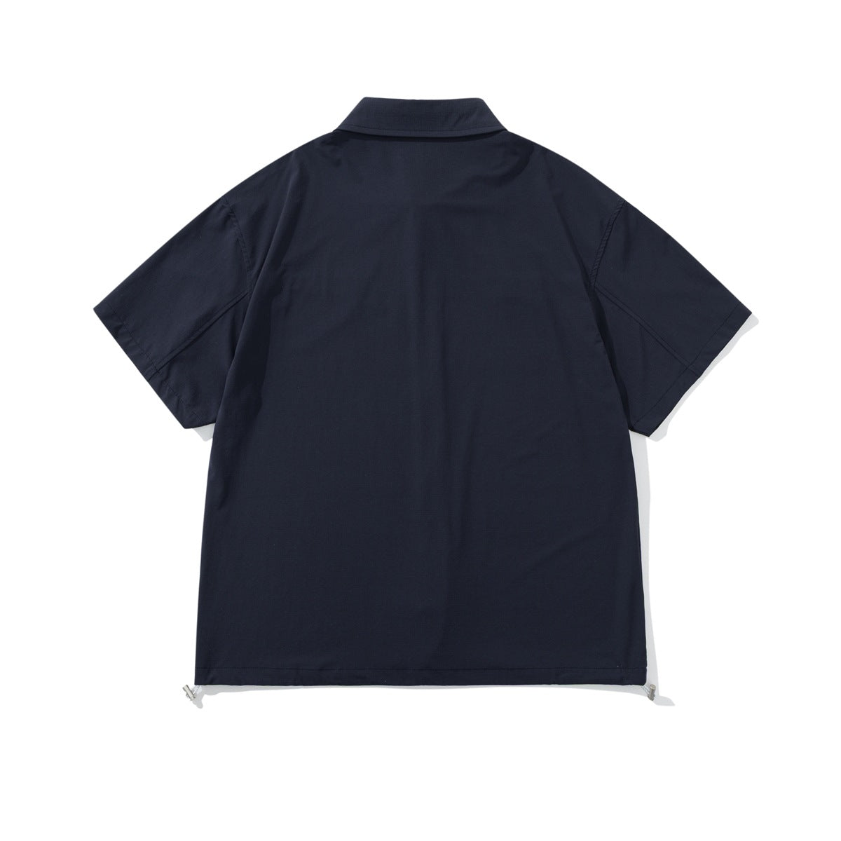 Back view of a navy short-sleeve button-up shirt with a collar and adjustable hem tabs.