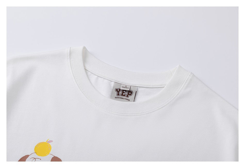 Close-up of a white T-shirt's ribbed crew neck and sewn-in label.