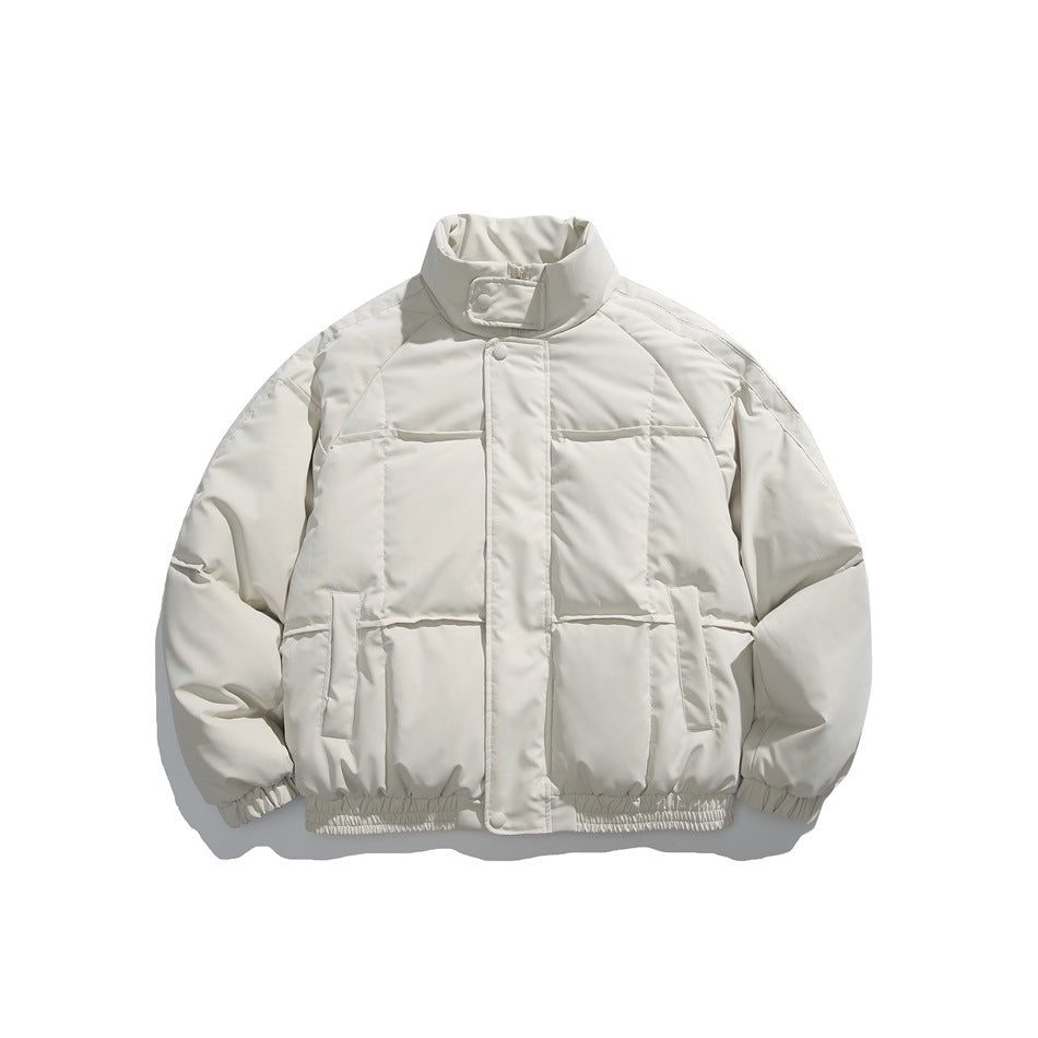 Front view of an off-white padded jacket with a high collar, snap placket, large panel stitching, side pockets, and elastic