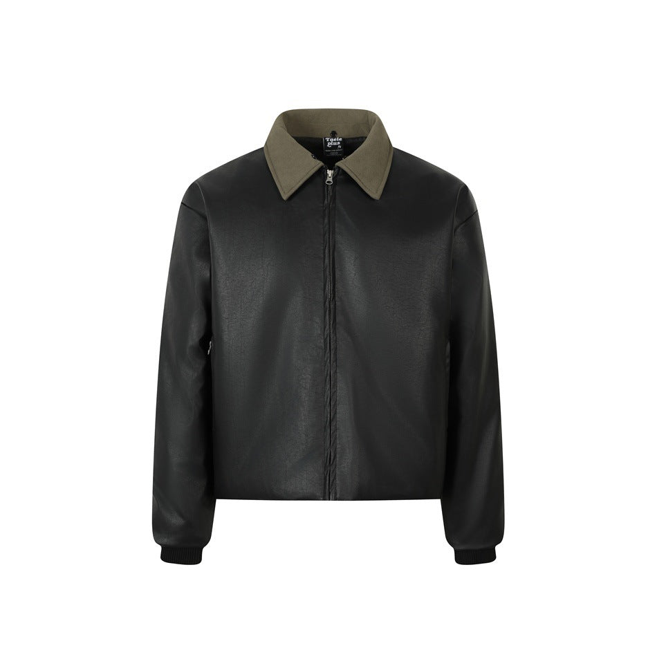 Front view of black faux leather zip jacket with olive collar and ribbed cuffs, fur collar removed