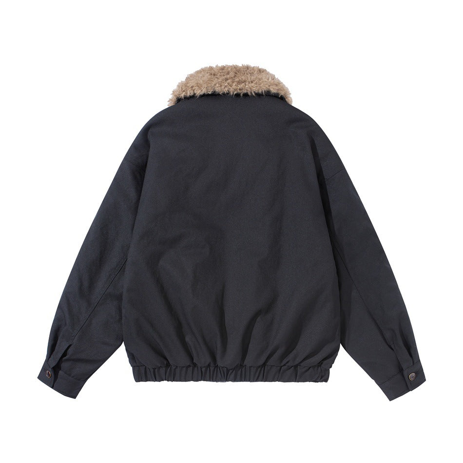 Back view of a dark navy jacket with a shaggy tan collar, long sleeves, and gathered hem.