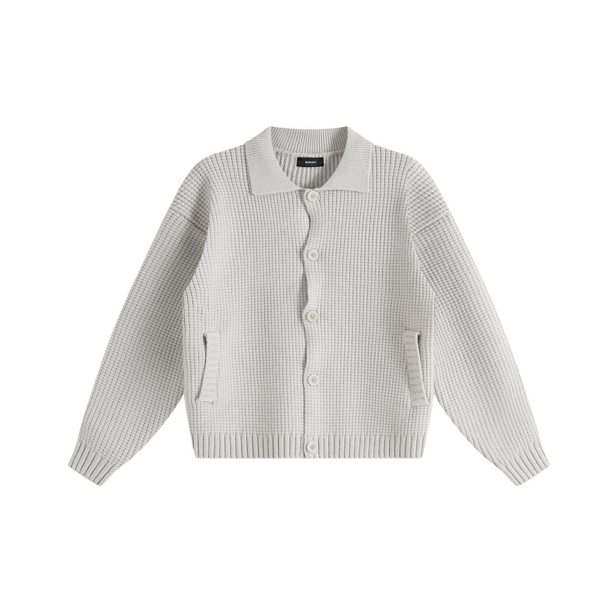 Beige waffle-knit button-front cardigan with collar, ribbed hem and cuffs, and front pockets, flat view