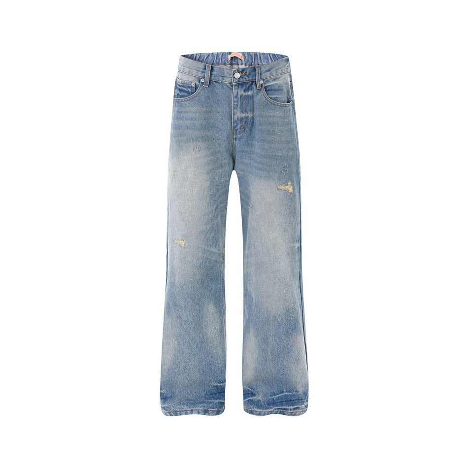 Front view of faded light blue straight-leg jeans with elastic back waistband visible and distressed patches