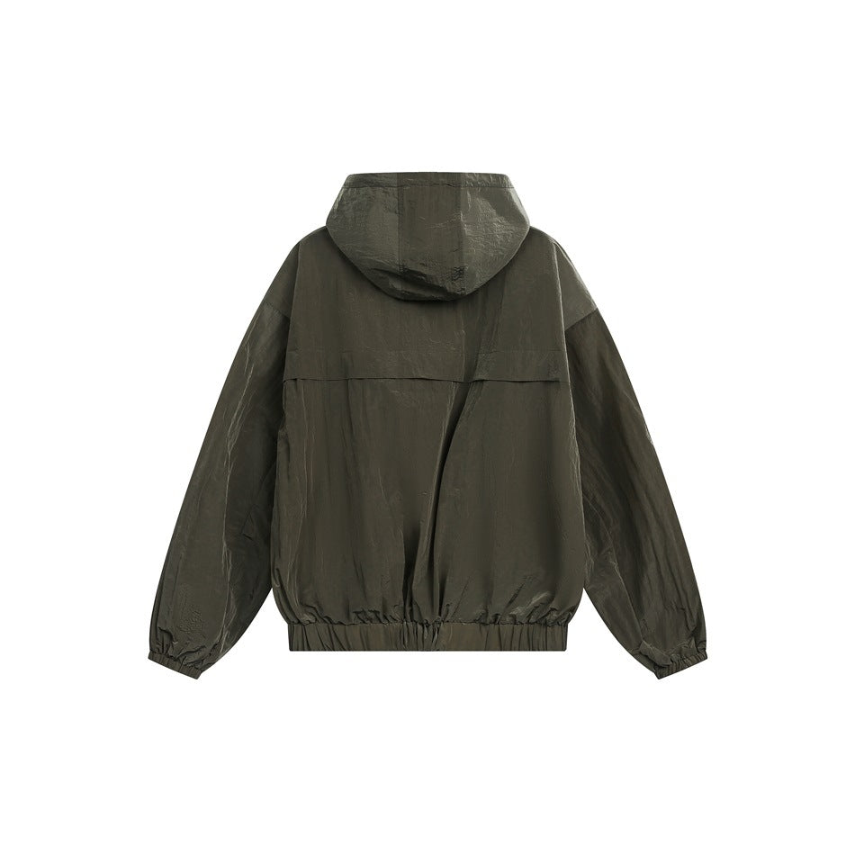 Back view of an olive hooded jacket laid flat, with a rear flap and gathered hem and cuffs.