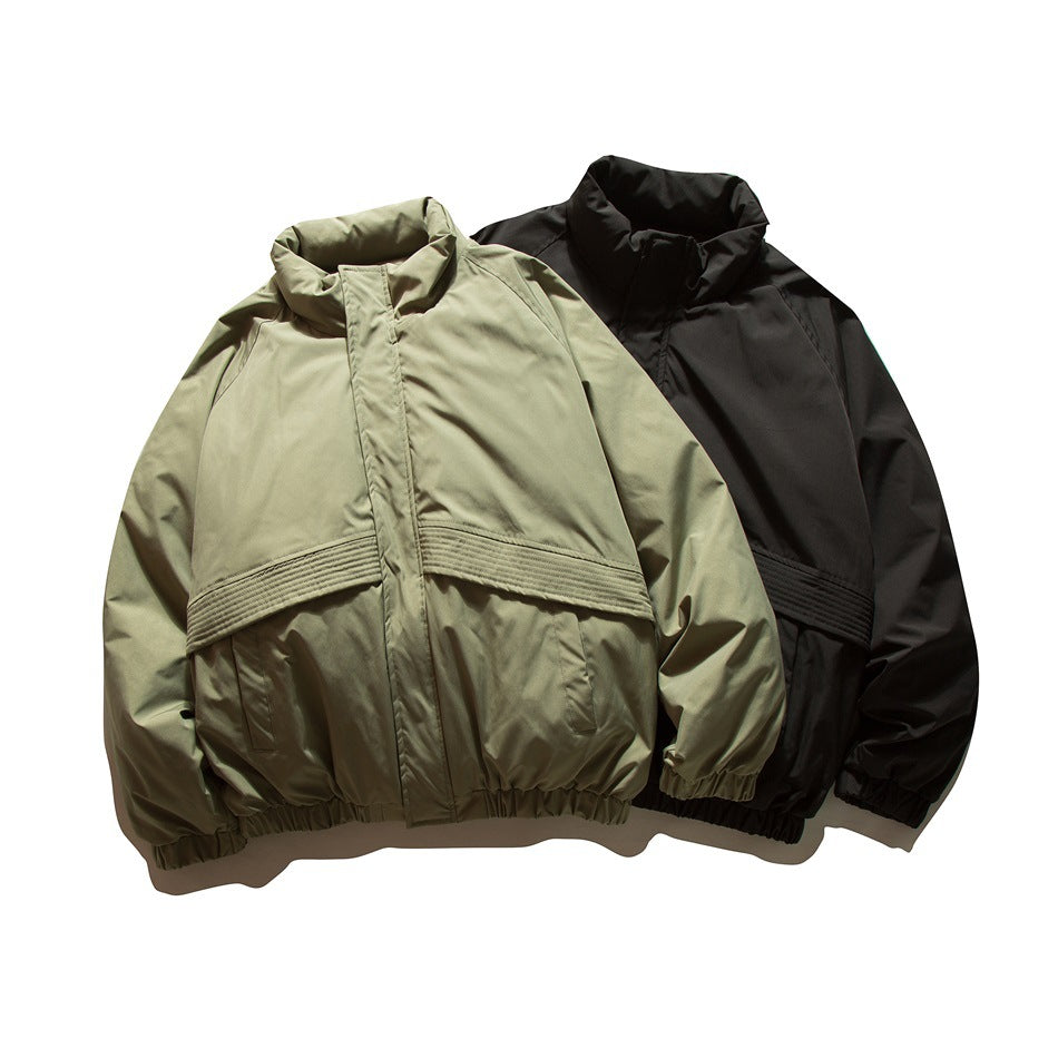 Front view of two jackets with tall collars, gathered hems and horizontal stitched bands, in olive and black.