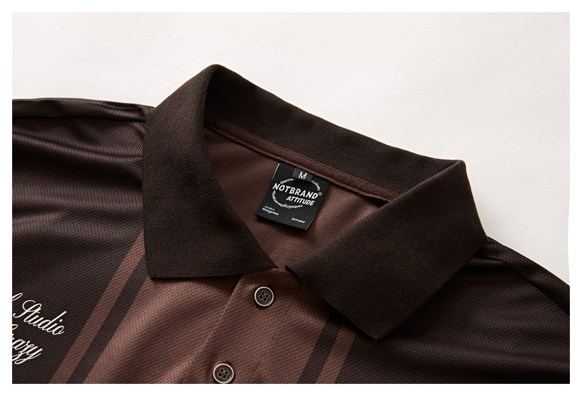 Close-up of the striped polo’s dark collar, button placket and inner neck label.