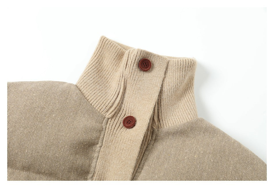 Close-up of the jacket's tall ribbed collar and front placket with two reddish-brown buttons.