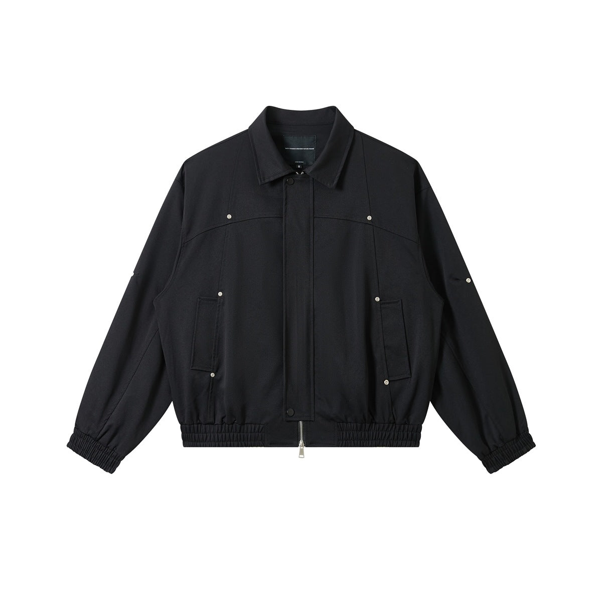 Black cropped zip jacket with collar, silver rivets, flap pockets and elastic cuffs and hem, flat front view
