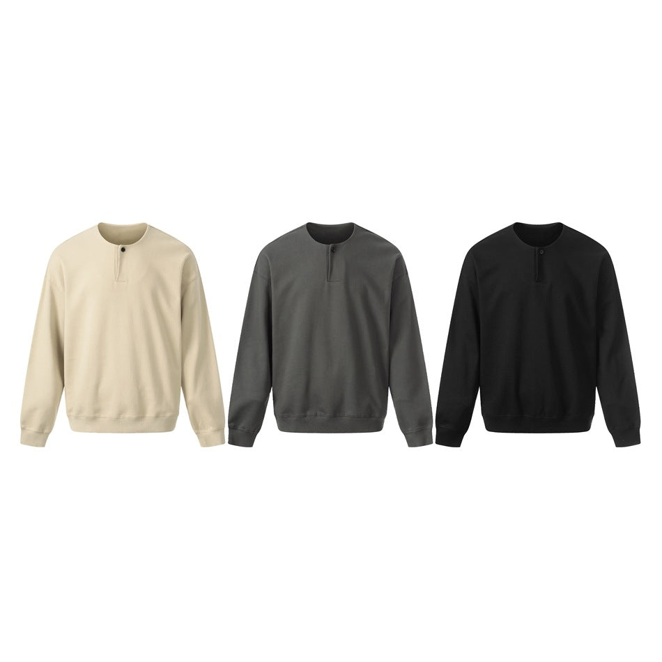 Three front views of the button-placket sweatshirt in light beige, charcoal, and black.