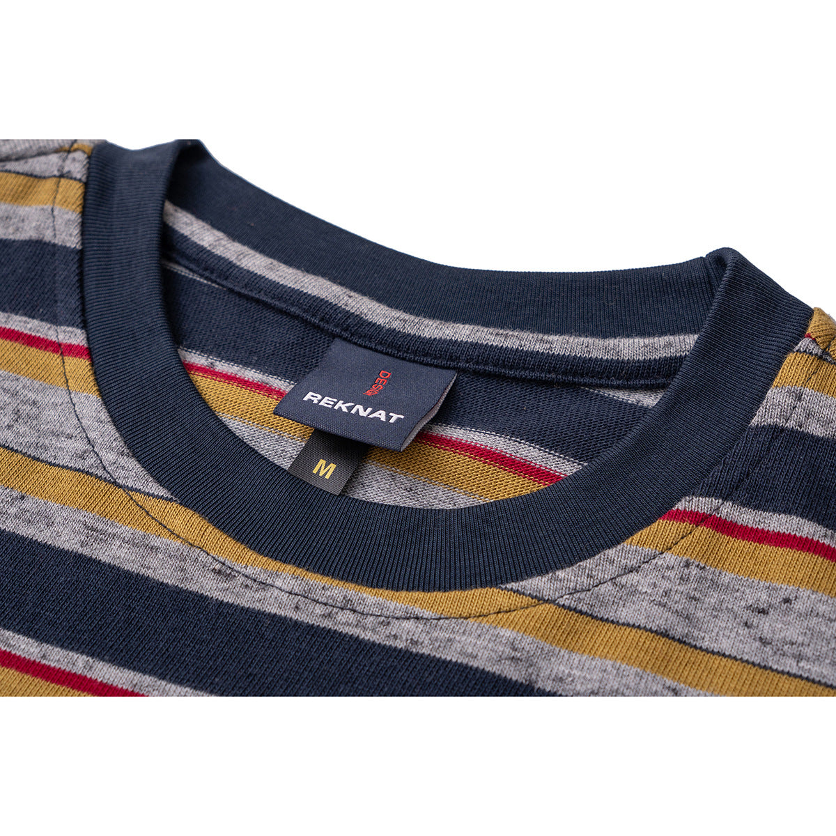 Close-up of a navy ribbed crew neck and sewn labels on a gray, navy, mustard and red striped T-shirt.
