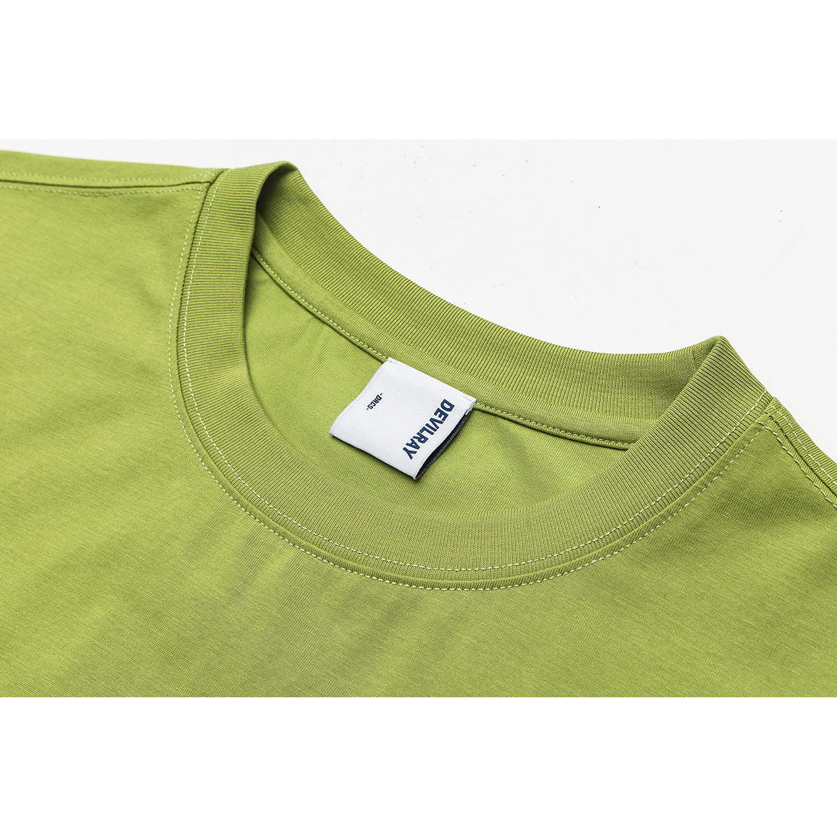 Close-up of a lime-green T-shirt crew neckline with ribbed trim, stitching, and a sewn neck label.
