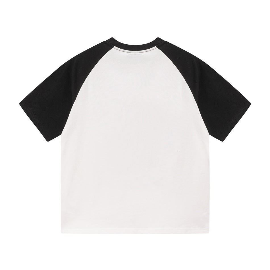 Back view of white raglan T-shirt with black sleeves and collar, plain with no print
