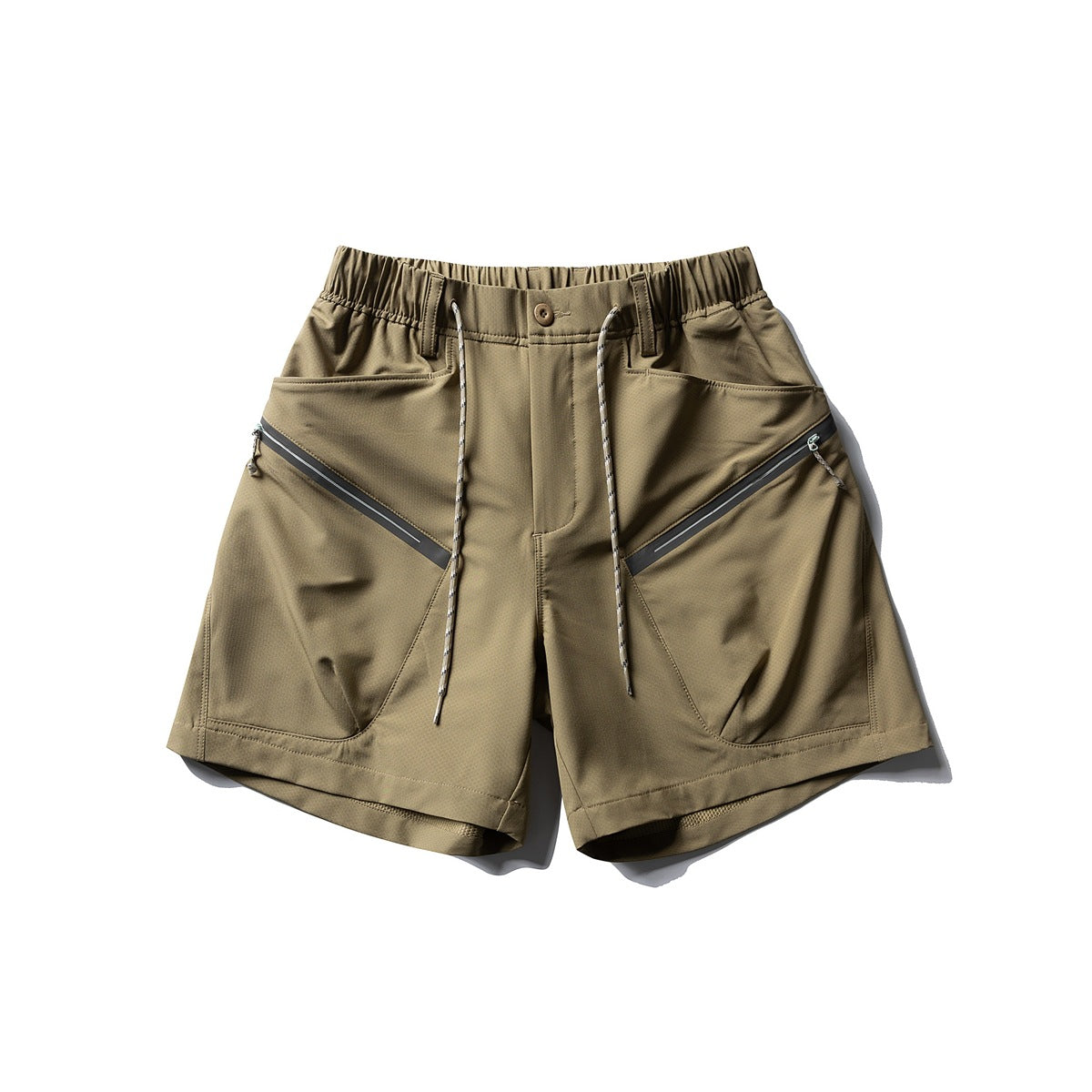 Camel tan wide-leg shorts with elastic waist, rope drawcord and diagonal zipper front pockets, flat lay