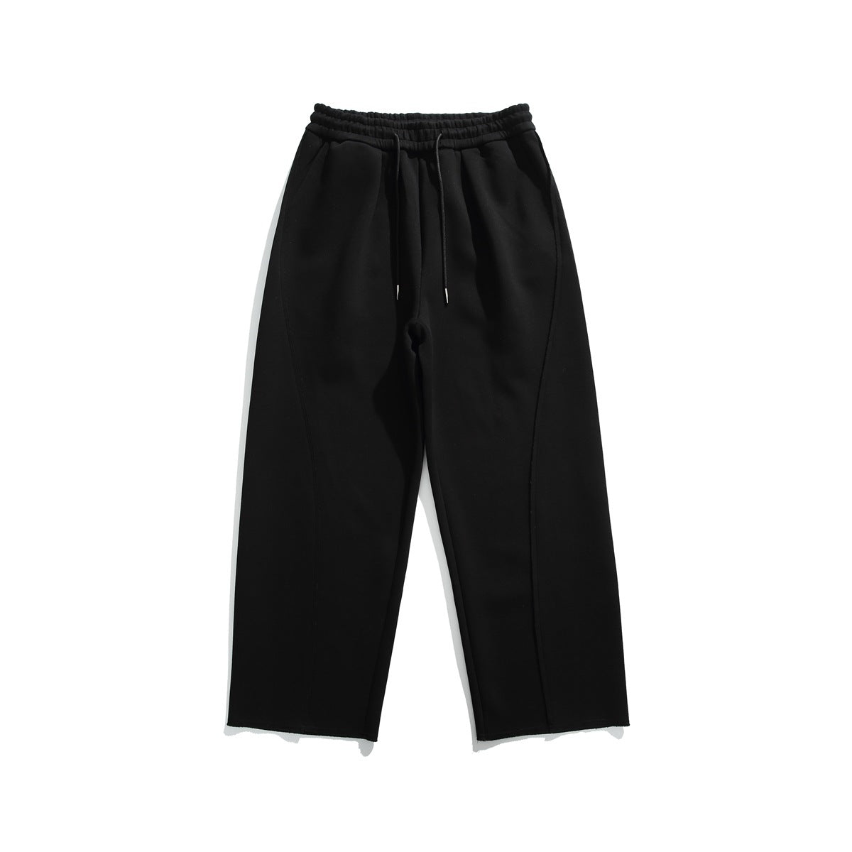 Black wide-leg sweatpants with drawstring waist, curved leg seams and raw hems, flat lay front view