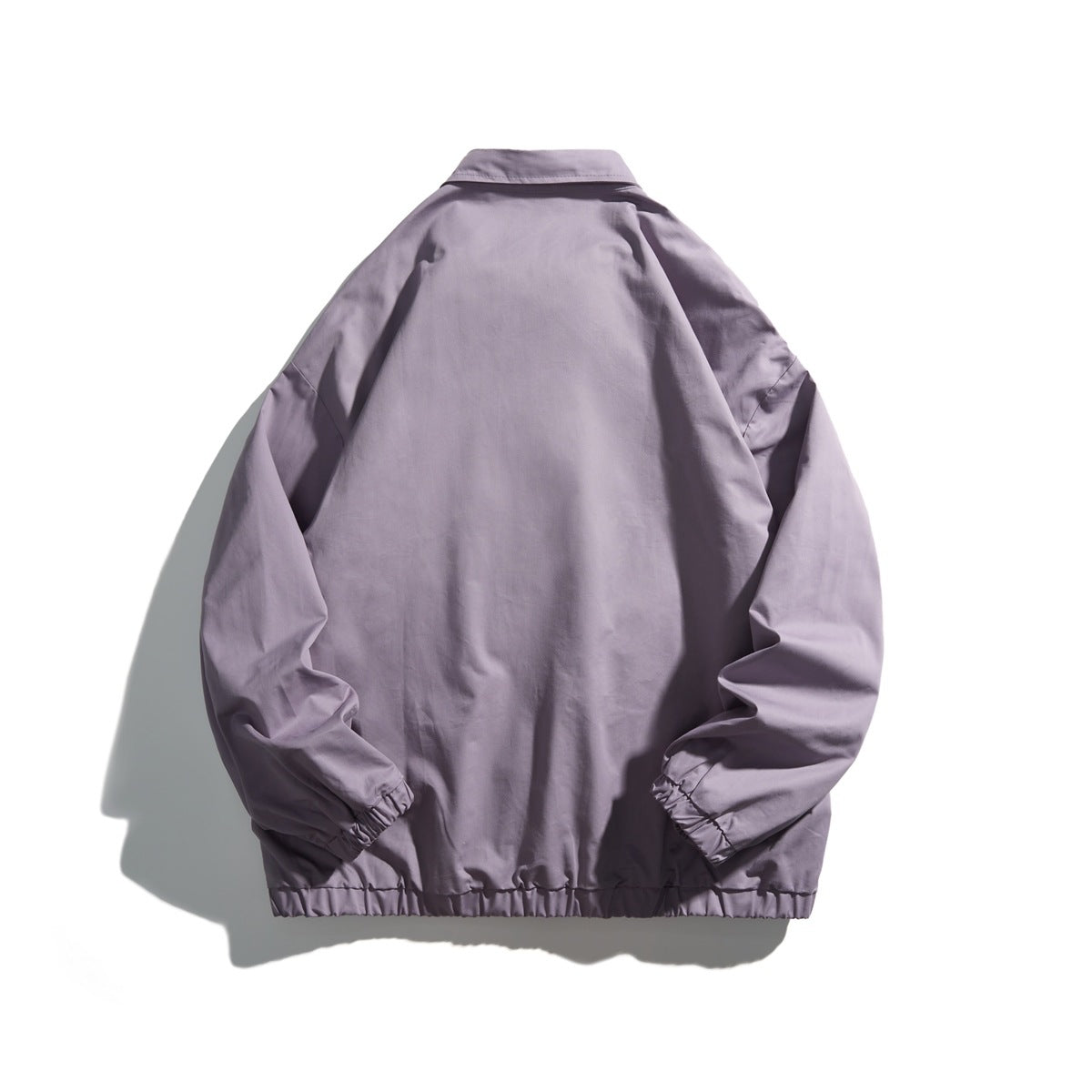 Back view of a purple jacket with pointed collar, plain back, elastic cuffs and an elastic hem
