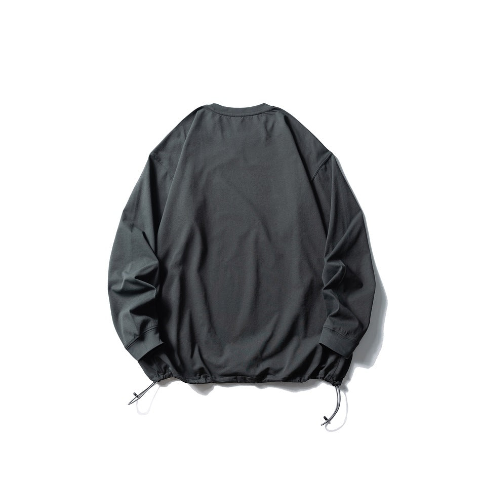 Back view of a charcoal gray long-sleeve pullover with a drawcord hem, laid flat on white.