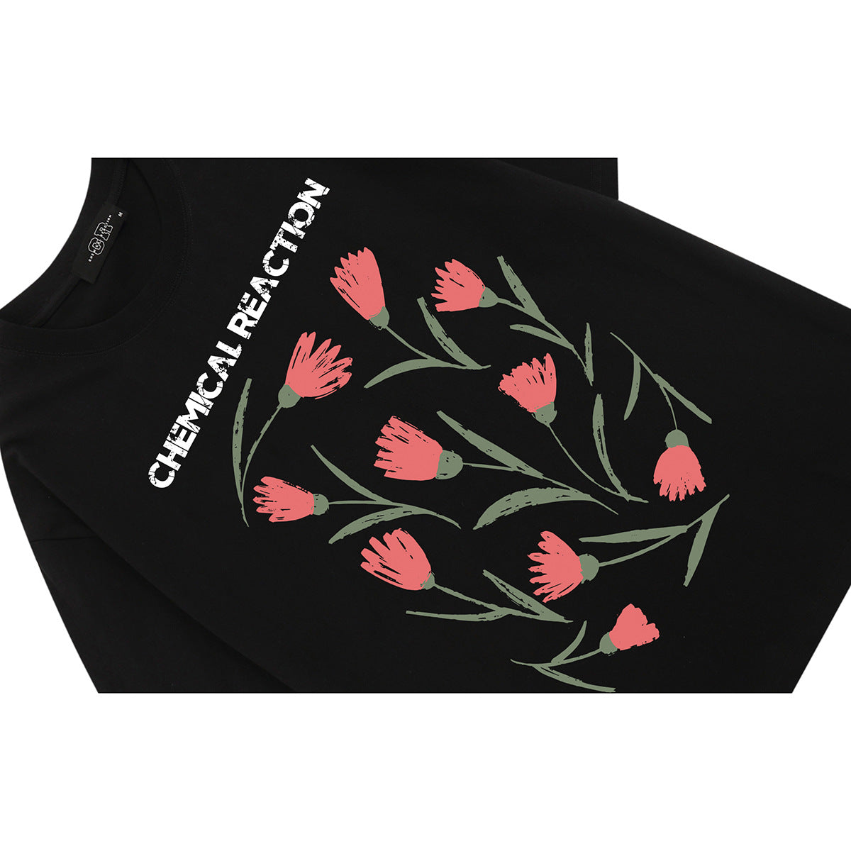 Close-up of a black T-shirt with a red flower and green stem print and white CHEMICAL REACTION lettering.