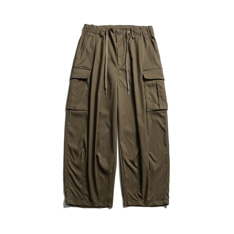 Olive green wide-leg cargo pants with drawstring waist and large flap cargo pockets, front view