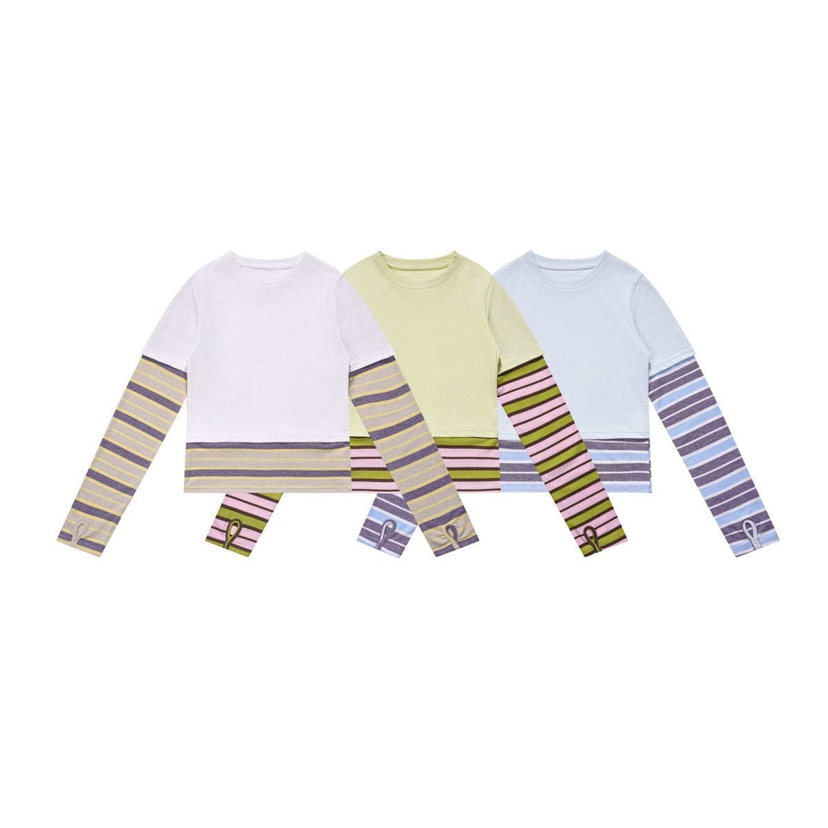 Three long-sleeve tops with solid short-sleeve overlays and striped sleeves and hems, shown in white, pale yellow, and light