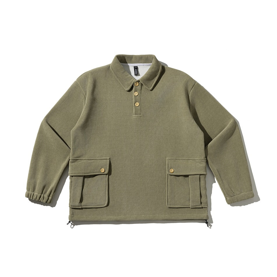 Olive green ribbed pullover with polo collar, three buttons, two flap pockets, elastic cuffs and drawstring hem, flat lay