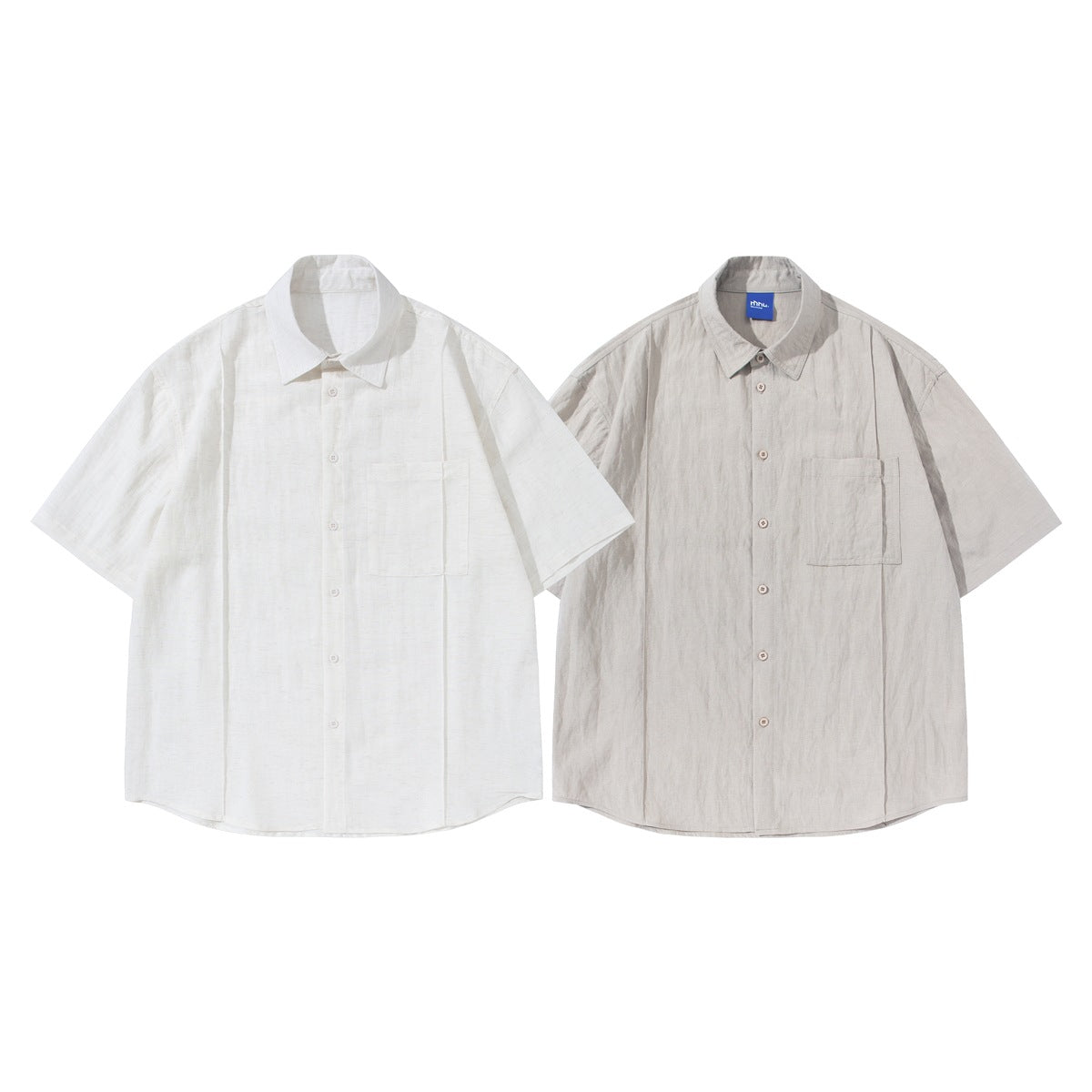 Two short-sleeve button-up shirts shown from the front in white and light beige, each with a chest pocket.
