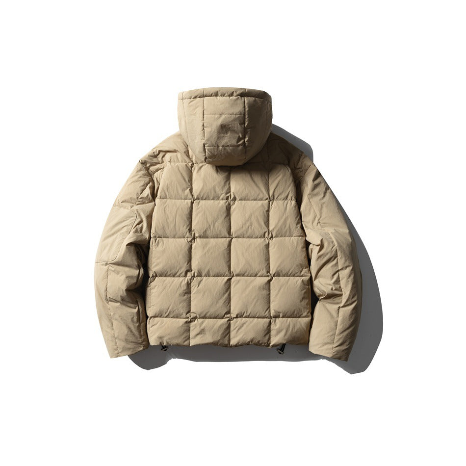Full back view of a tan hooded puffer jacket with large square quilted panels.