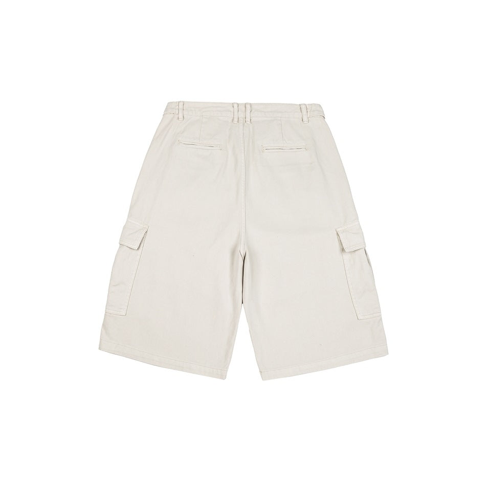 Back view of off-white wide-leg cargo shorts with two welt pockets and side cargo pockets.