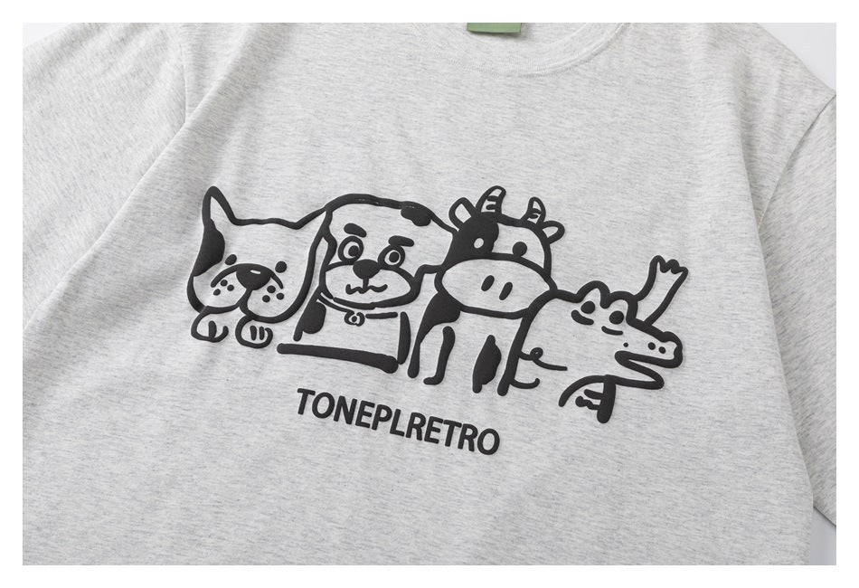 Light gray heather T-shirt chest print showing four cartoon animals above black lettering.