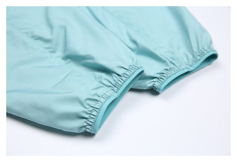 Close-up of two elasticated edges on an aqua garment.