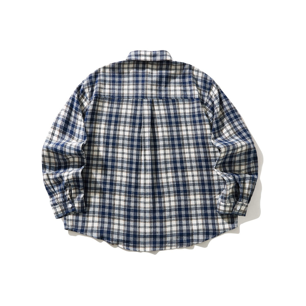 Back view of a navy, cream, and beige plaid long-sleeve button-up shirt with a curved hem.